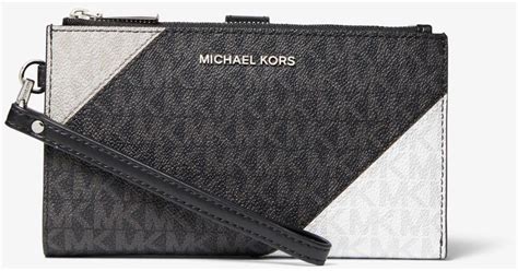 michael kors adele logo smartphone wallet|Michael Kors Wallet phone holder.